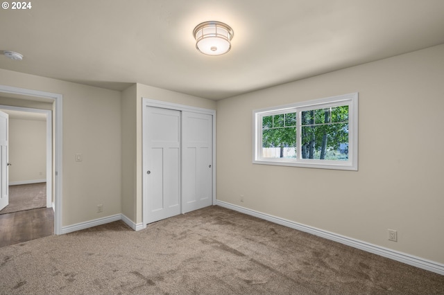 52582 Doe Ln, La Pine, OR 97739 - unfurnished bedroom with baseboards, carpet, and a closet