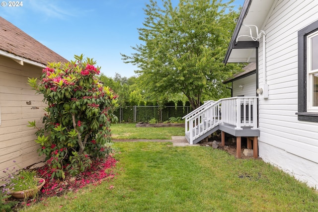 view of yard featuring a deck