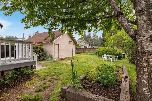 view of yard with a deck