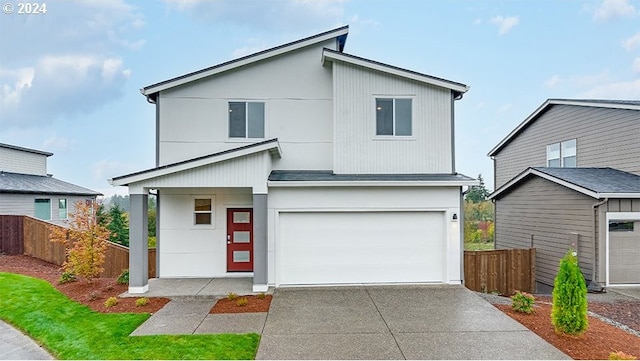 view of front of property with a garage