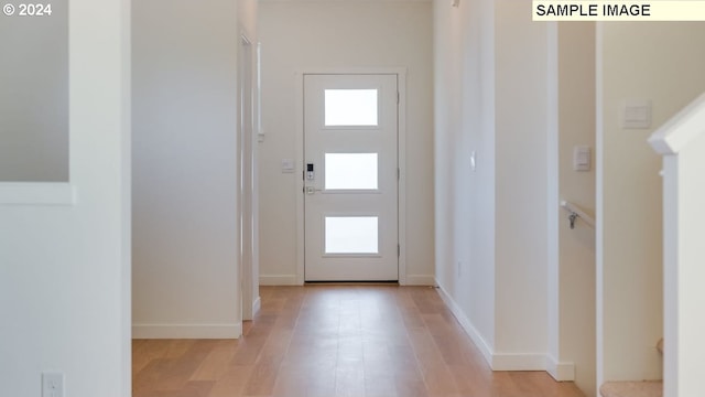 foyer featuring light wood-type flooring