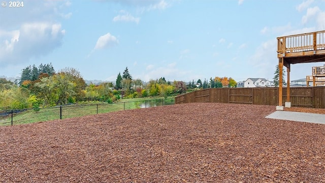 view of yard with a water view