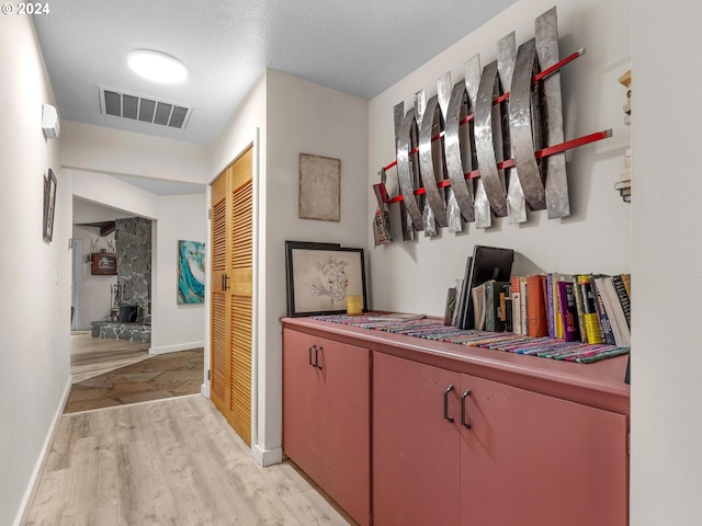 hallway featuring light hardwood / wood-style floors