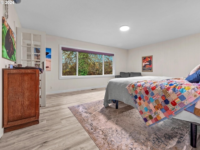 bedroom featuring light wood-type flooring