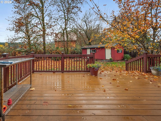 wooden deck with a shed