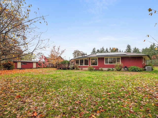 exterior space featuring cooling unit and a wooden deck