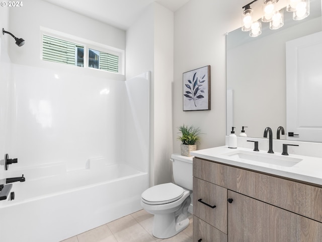 full bathroom featuring tile patterned floors, vanity, bathtub / shower combination, and toilet