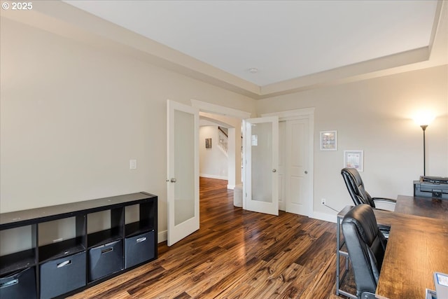 office space featuring french doors, baseboards, and dark wood-style flooring