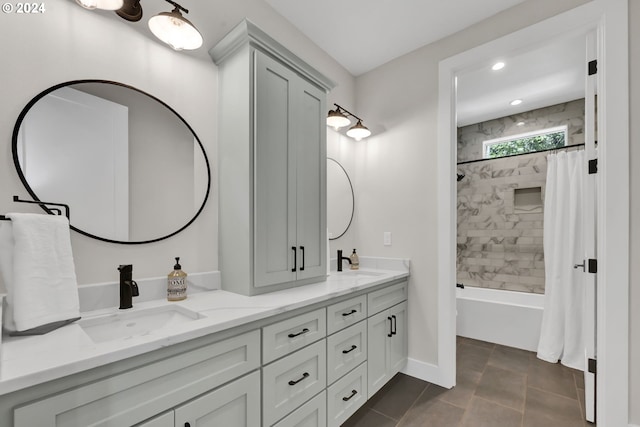 bathroom featuring tile patterned floors, vanity, and shower / tub combo