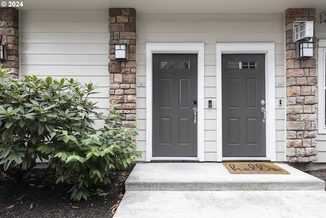 view of exterior entry with stone siding