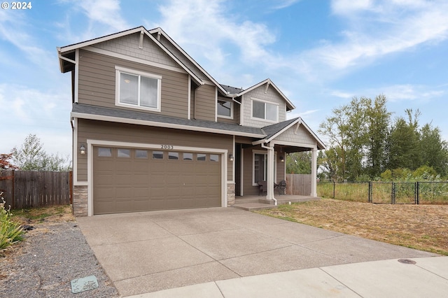 craftsman-style house featuring a garage