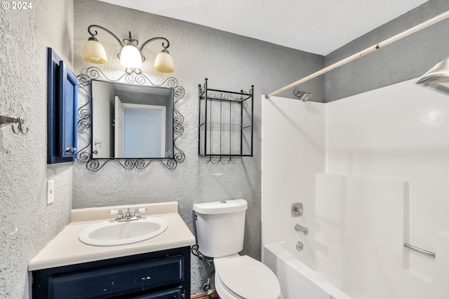 full bathroom featuring toilet, vanity, and bathing tub / shower combination