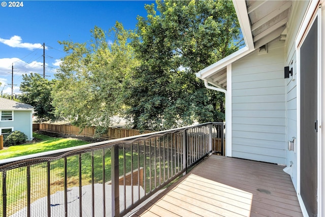 deck featuring a lawn