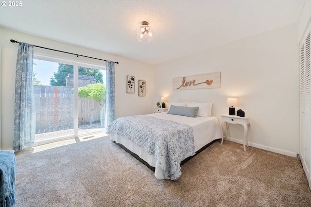 3427 NE 32nd Pl, Portland, OR 97212 - bedroom featuring carpet floors, access to outside, baseboards, and a closet