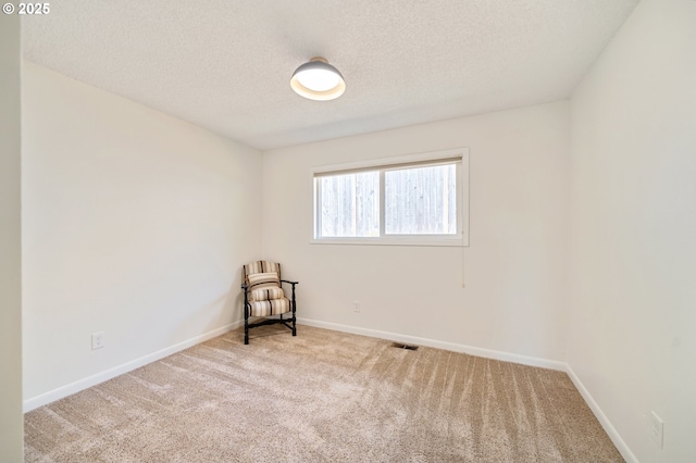 3427 NE 32nd Pl, Portland, OR 97212 - unfurnished room with carpet, baseboards, and a textured ceiling