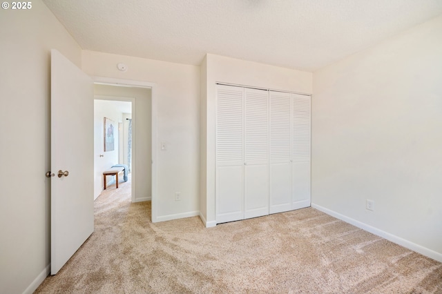 3427 NE 32nd Pl, Portland, OR 97212 - unfurnished bedroom featuring carpet, baseboards, and a closet