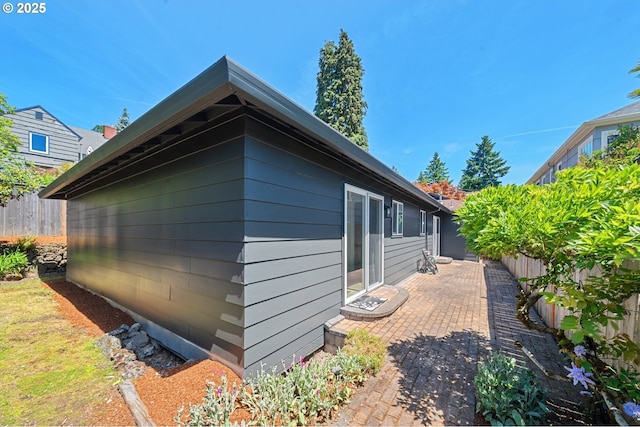 3427 NE 32nd Pl, Portland, OR 97212 - view of side of home with a patio