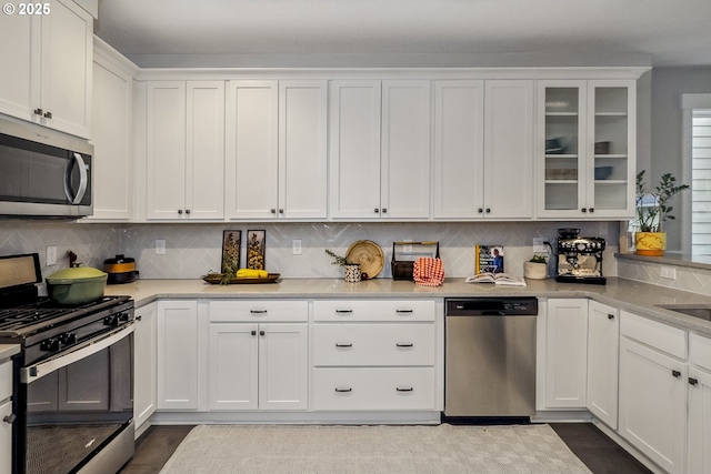 kitchen with white cabinets and stainless steel appliances