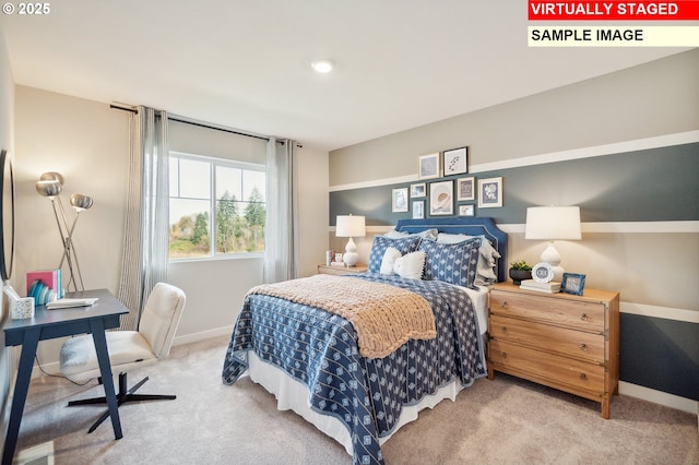 bedroom featuring baseboards and carpet floors