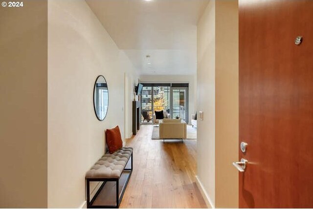 hallway featuring light wood-type flooring