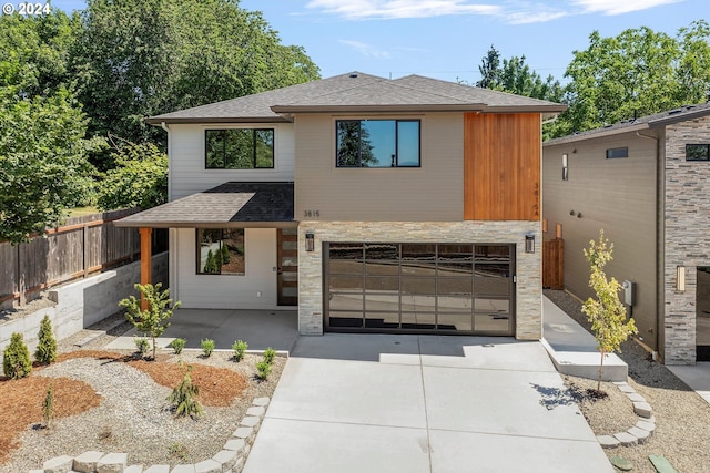 view of front of home with a garage