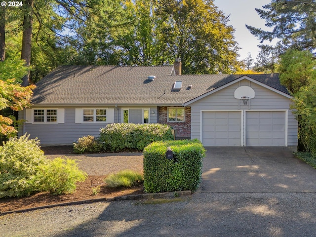 single story home with a garage