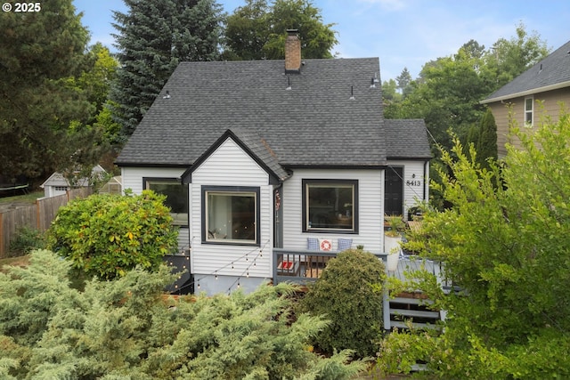 8413 SW 4th Ave, Portland, OR 97219 - view of front of property featuring a chimney, roof with shingles, and a deck