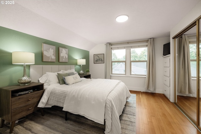8413 SW 4th Ave, Portland, OR 97219 - bedroom with vaulted ceiling and hardwood / wood-style flooring