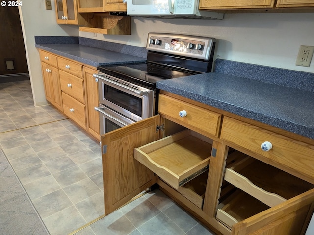 kitchen featuring double oven range