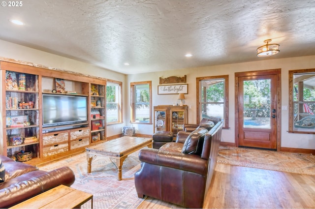48612 Duff Rd, Adams, OR 97810 - living area with baseboards, wood finished floors, and a wealth of natural light