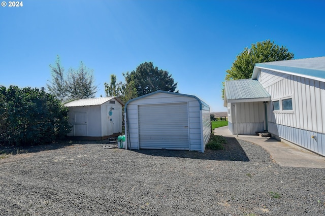 48612 Duff Rd, Adams, OR 97810 - garage featuring a storage shed