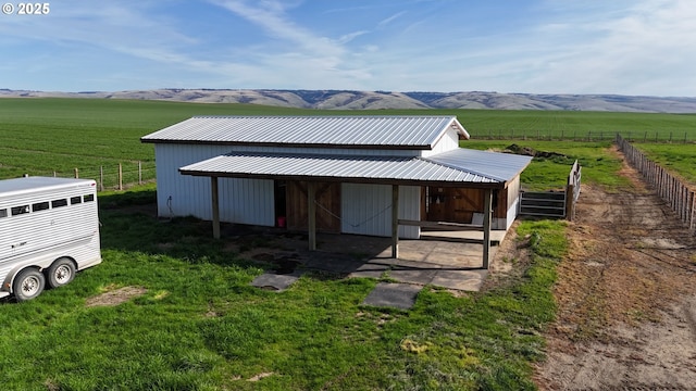 48612 Duff Rd, Adams, OR 97810 - view of outbuilding with a rural view, an exterior structure, an outbuilding, and a mountain view