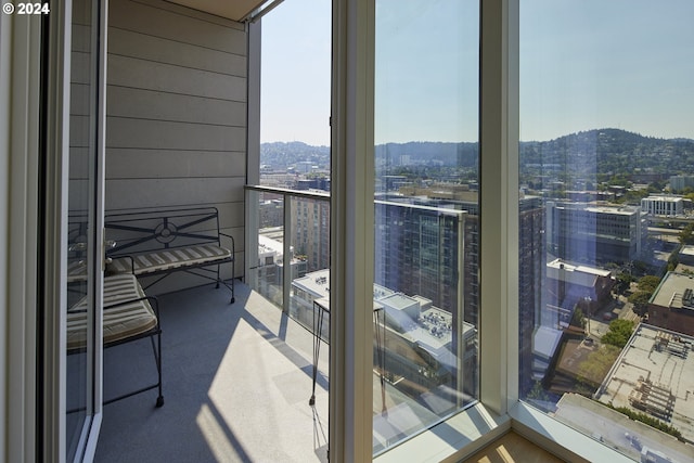 balcony featuring a mountain view