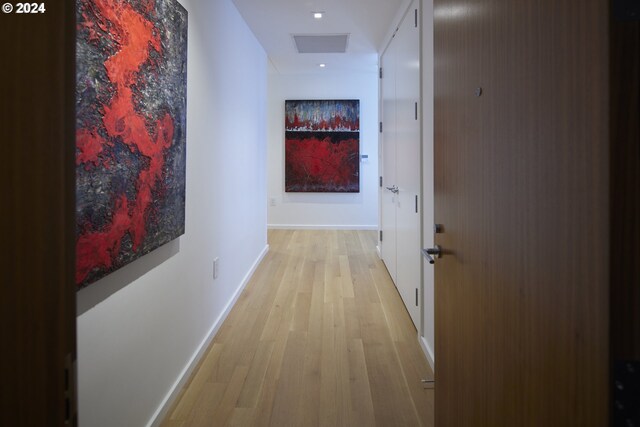 hallway featuring light wood-type flooring