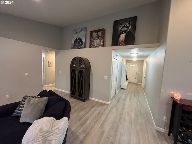 living room with light hardwood / wood-style flooring