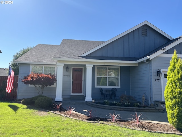 view of front facade with a garage and a front lawn