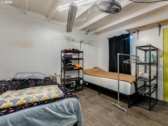 bedroom with wood-type flooring