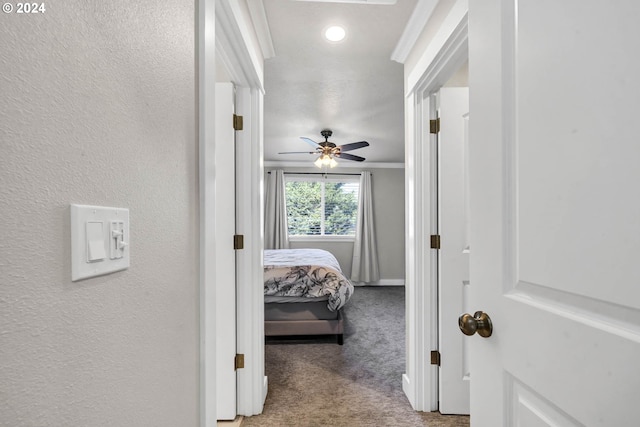 carpeted bedroom featuring ornamental molding