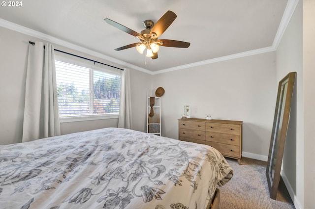 bedroom with crown molding, carpet flooring, and ceiling fan