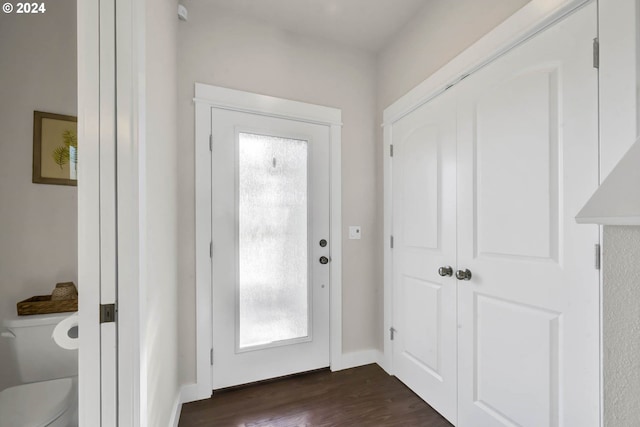 doorway to outside with dark hardwood / wood-style floors