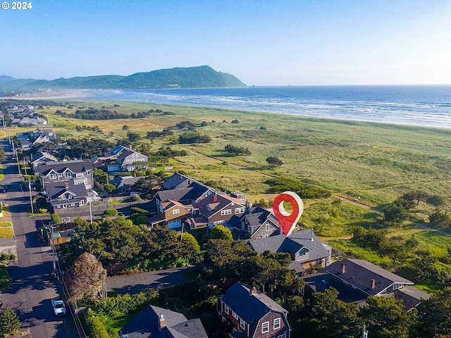 bird's eye view featuring a beach view and a water and mountain view