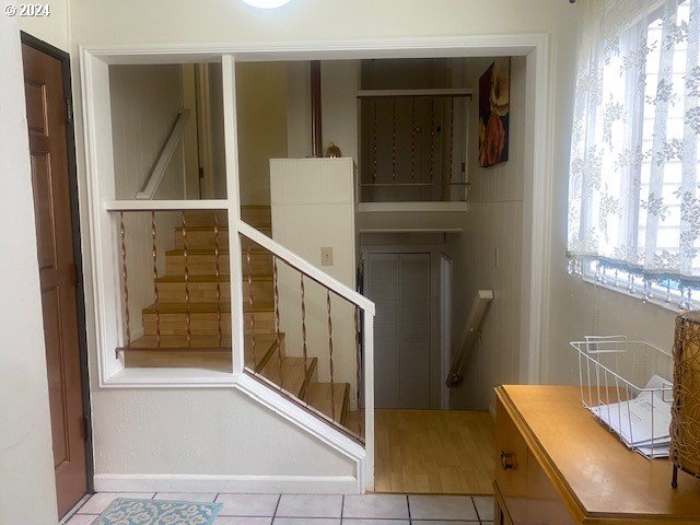 staircase with tile patterned flooring