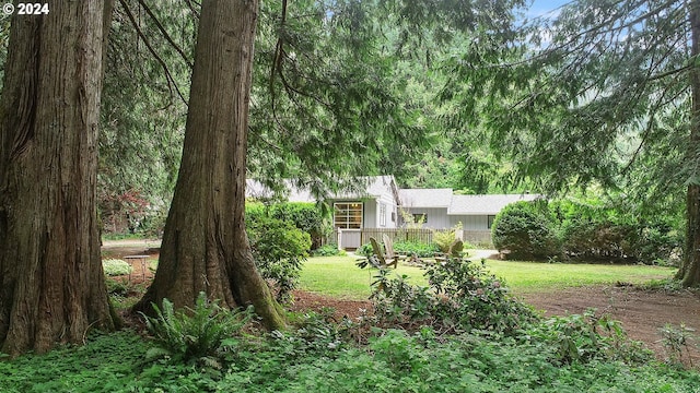 exterior space featuring a front lawn