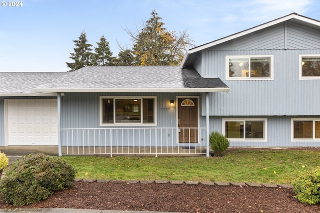 split level home featuring a garage