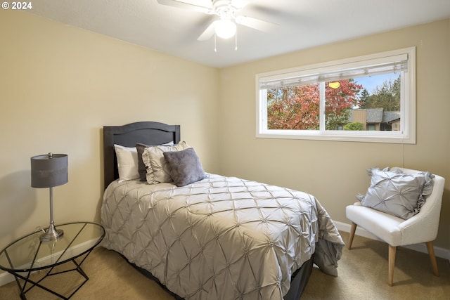 bedroom with ceiling fan and carpet floors