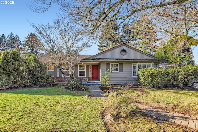 ranch-style home with a front lawn