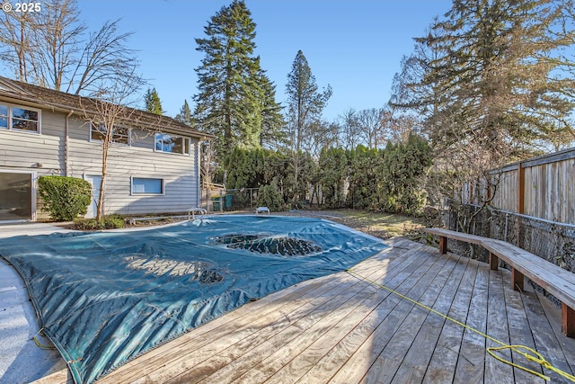 view of pool featuring a wooden deck