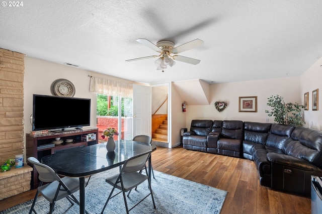 office space featuring a textured ceiling, hardwood / wood-style floors, and ceiling fan