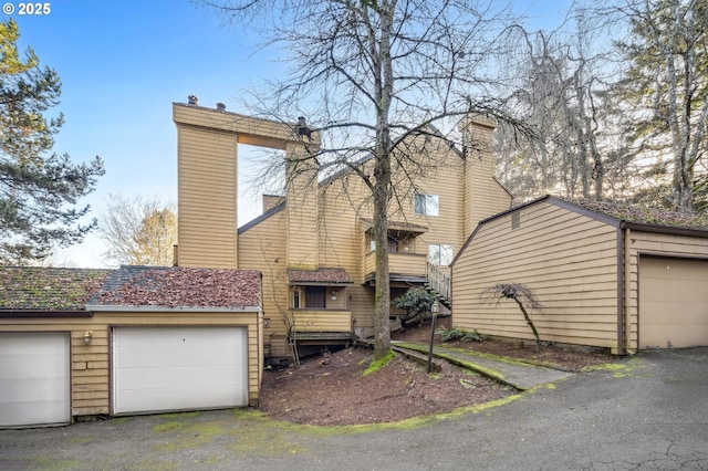 exterior space with a garage