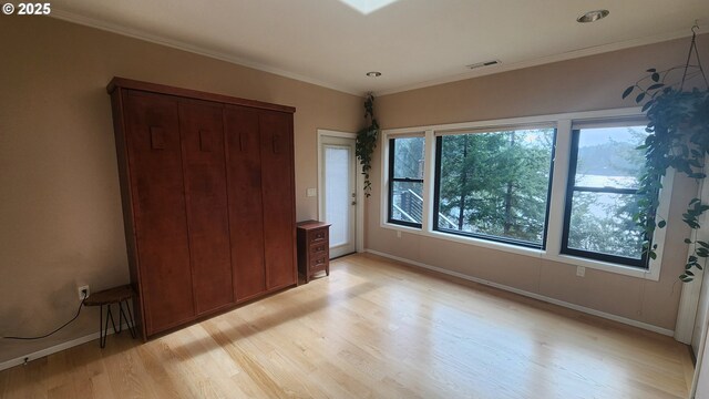 bathroom with vanity, hardwood / wood-style flooring, toilet, and wooden walls